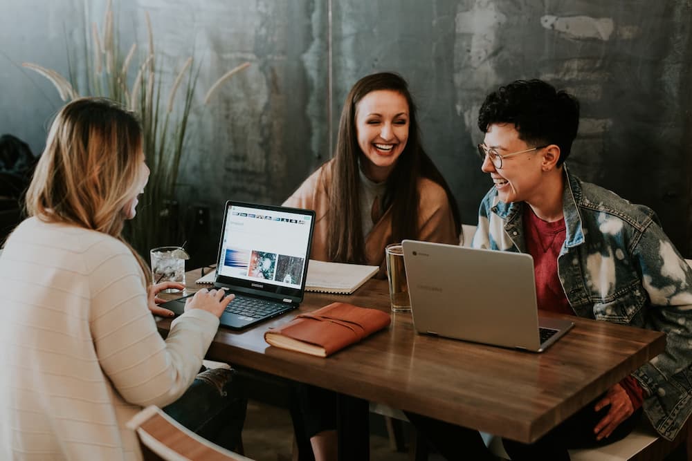 People working together on laptop